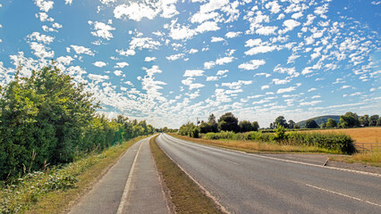 Altocumulus Floccus in the blue sky.