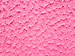 Texture and background of pink decorative plaster on a cement wall