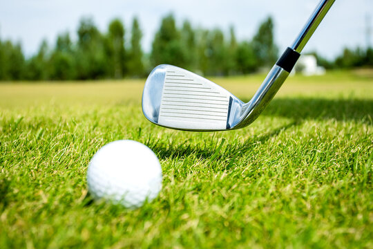 Close up of Golf Ball on tee in Golf course . Sport background, Paste the text into the space right hand side
