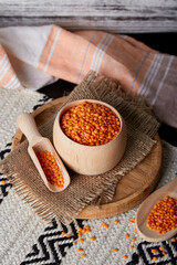 Raw lentil before cooking. Healthy superfood on the natural background. Aesthetic vegan product