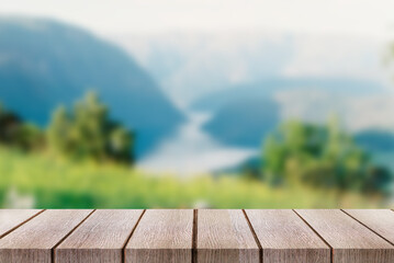 Wooden desktop with blurred background