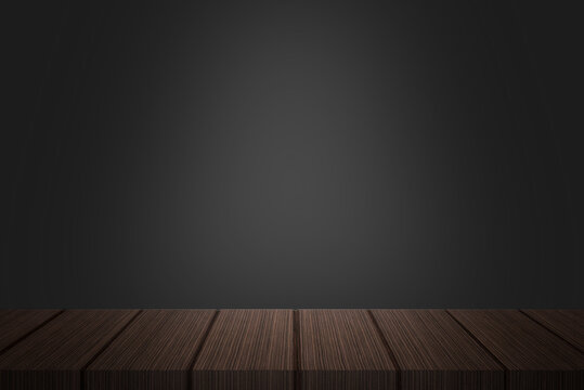 Wooden desktop with dark background