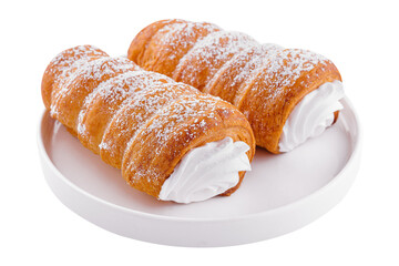 Baked tubules with whipped cream on plate