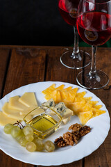 Cheese plate and wine glasses