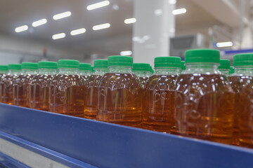 Juice bottling line in a factory.