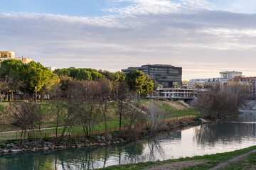 Obraz premium Landscape view on the Lez river with City Hall in background, Montpellier, France