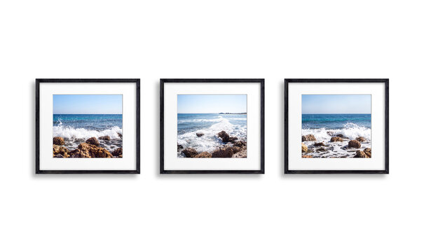 Three black frames set with ocean view pictures, isolated on white wall, 3D illustration