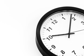 Round wall black and white clock. Time to work or rest concept