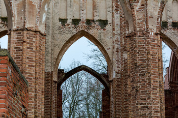 Arched door at Tartu Cathedral. This is the main point of interest in Tartu. Ruins of huge gothic...