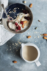 homemade yogurt bowl with raspberry, and granola - healthy food style