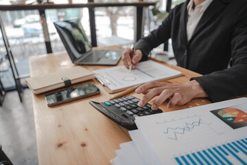 Businessman and Certified Public Accountant (CPA) auditor providing accounting and auditing services in the same company and stock market chart data and anti bribery of accounting