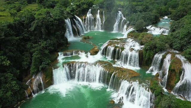 The beautiful Ban Gioc waterfalls on the border with China, Asia, northern Vietnam, in Cao Bang, towards Lang Son, in summer, on a sunny day.