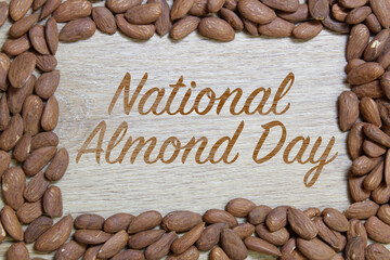 Healthy food concept idea. National almond day. Frame made with nut. 