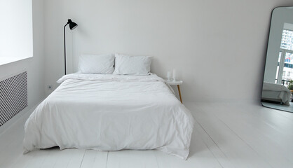 Concept of interior design in white modern apartment. Cozy bedroom with home decor, houseplant,...