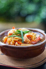 udon noodles kimchi pork shrimp focus view