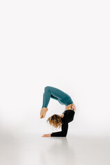 Woman practicing Yoga with white background