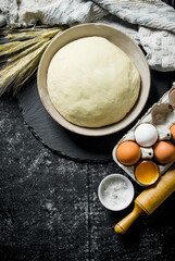 Dough and ingredients to prepare the dough.
