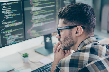Photo of clever pensive freelancer wear eyeglasses hands arms chin creating safety app modern...