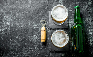 Beer in glasses on the stand.