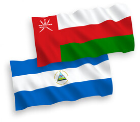 Flags of Sultanate of Oman and Nicaragua on a white background