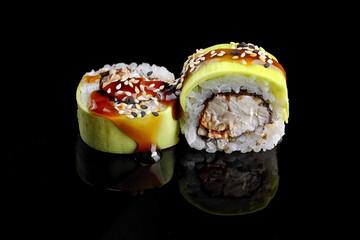 Green dragon sushi roll with eel, avocado and Philadelphia cheese