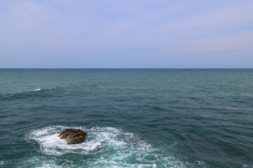 Rock, sea and the horizon