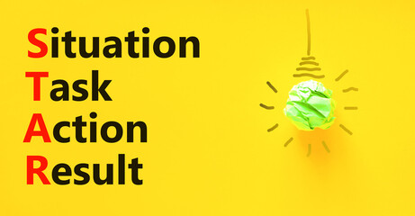 STAR situation task action result symbol. Concept words STAR situation task action result on yellow paper on beautiful yellow background. Business STAR situation task action result concept. Copy space