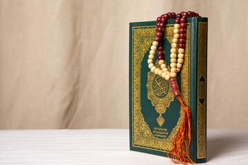 Concept: open Quran book  local language holy prayers for god,Coran - holy book of Muslims...