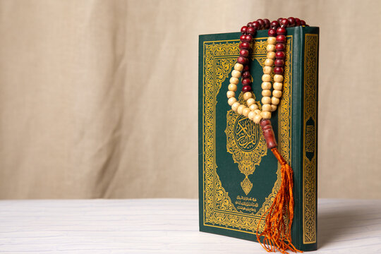 Concept: open Quran book  local language holy prayers for god,Coran - holy book of Muslims religion,
Friday month of 1444 Puasa Ramadan religion Islamic worshiping faith