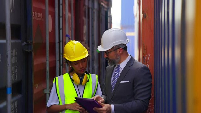 Female foreman and engineer worker man shipping logistics team, work collaboration in supply chain, industrial cargo and production inspection. Distribution industry freight checklist.