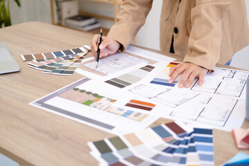 Architect designer Interior creative working drawing sketch plan  selection material color samples...