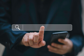 SearchEngine Optimization SEO Networking Concept.handof businessman working with computer laptop on desk in office.Searching Browsing Internet Data Information with blank search bar.