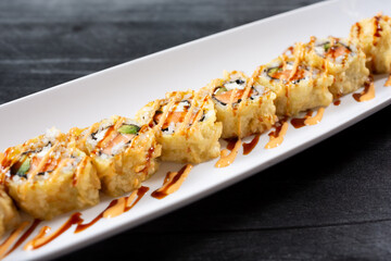 A view of a crusted Philly sushi roll.