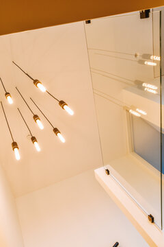 Stylish lamps in modern corridor