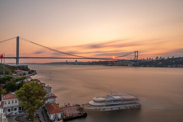 Istanbul Bosphorus Bridge at sunset. 15 July Martyrs Bridge. Sunset view from Beylerbeyi. Istanbul, Turkey Long Exposure.