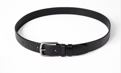 Black leather belt for trousers and jeans. Fastened fashionable men leather belt with dark chrome...