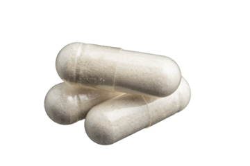 White medical capsules or pills for treatment isolated on transparent background, medicine and healthcare concept, close-up view