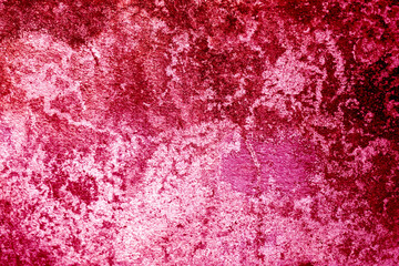 old grunge concrete wall texture or background viva magenta color of the year 2023