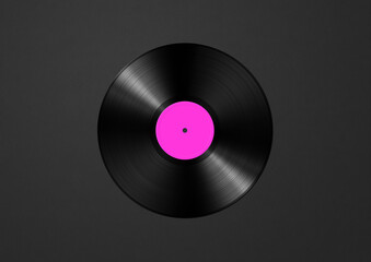 Pink vinyl record isolated on black background