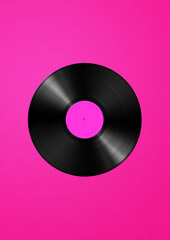 Vinyl record isolated on pink background
