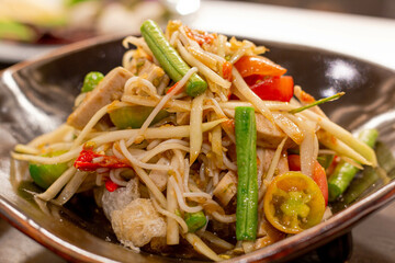 Thai Style Papaya Salad, Salted Crab and Fermented Fish.
