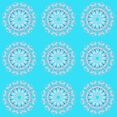 Tile. Background, texture of blue snowflakes in pastel colors.