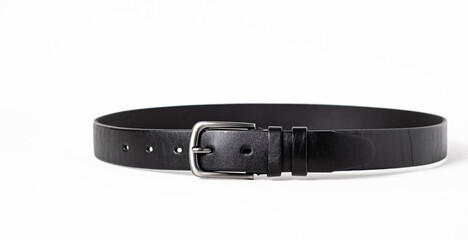 Black leather belt for trousers and jeans. Fastened fashionable men leather belt with dark chrome matted metal buckle isolated on white background. Male accessory. Luxury strap. Haberdashery goods - Powered by Adobe