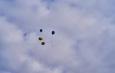 air balloons of the Ukraine flag colors in the sky