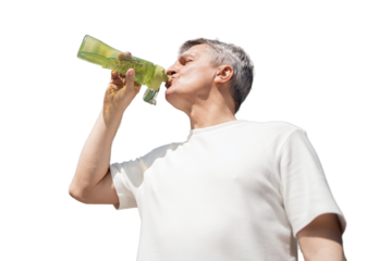 A retired man drinking water from a plastic bottle, isolated transparent background.