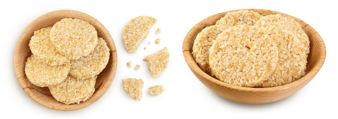 coconut cookies with white flax seeds and honey in wooden bowl isolated on white background. Healthy food. Top view. Flat lay