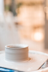 studio of ceramics with clay on a potter's wheel