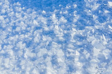 Fototapeta na wymiar Frosty pattern, snow pattern, hoarfrost. Background texture, abstract pattern, winter.