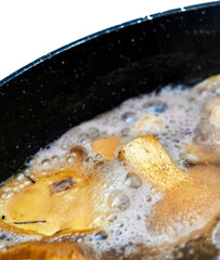 very tasty mushrooms are cooked in a saucepan with water