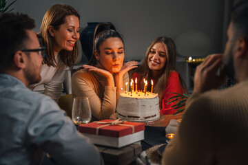 Woman celebrates her birthday with close friends